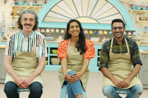 The Great British Baking Show: 
The three Baking Show finalists sit awaiting critiques on their penultimate bakes.
