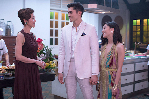 Michelle Yeoh as Eleanor Young (left), Henry Golding as Nick Young (center) and Constance Wu as Rachel Chu (right) in 2018 hit Crazy Rich Asians. 