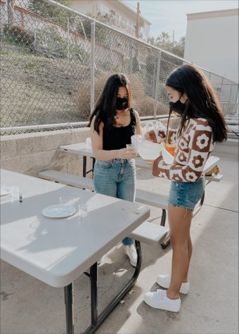Emersen and her younger sister lead a WiSTEM+ workshop at their local boys and girls club.