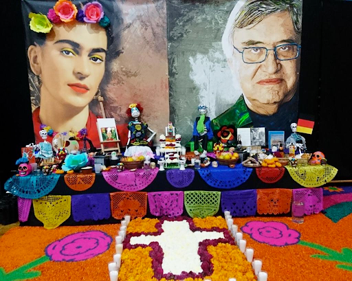 An ofrenda is a traditional altar adorned with marigolds, sugar skulls, and other colorful offerings.

Picture Courtesy: OHS student Josue Garcia Patino, German School Lomas Verdes, Mexico 
