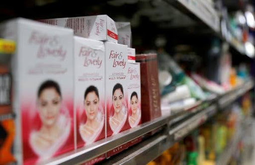 An aisle of skin-lightening products at the market, including the now rebranded “Fair & Lovely,” with a light-skinned model plastered on each package. (The New York Times).