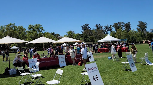 Pixel families gather at registration desks for the 2024 PGGW Carnival, held at Robel Field on Friday.